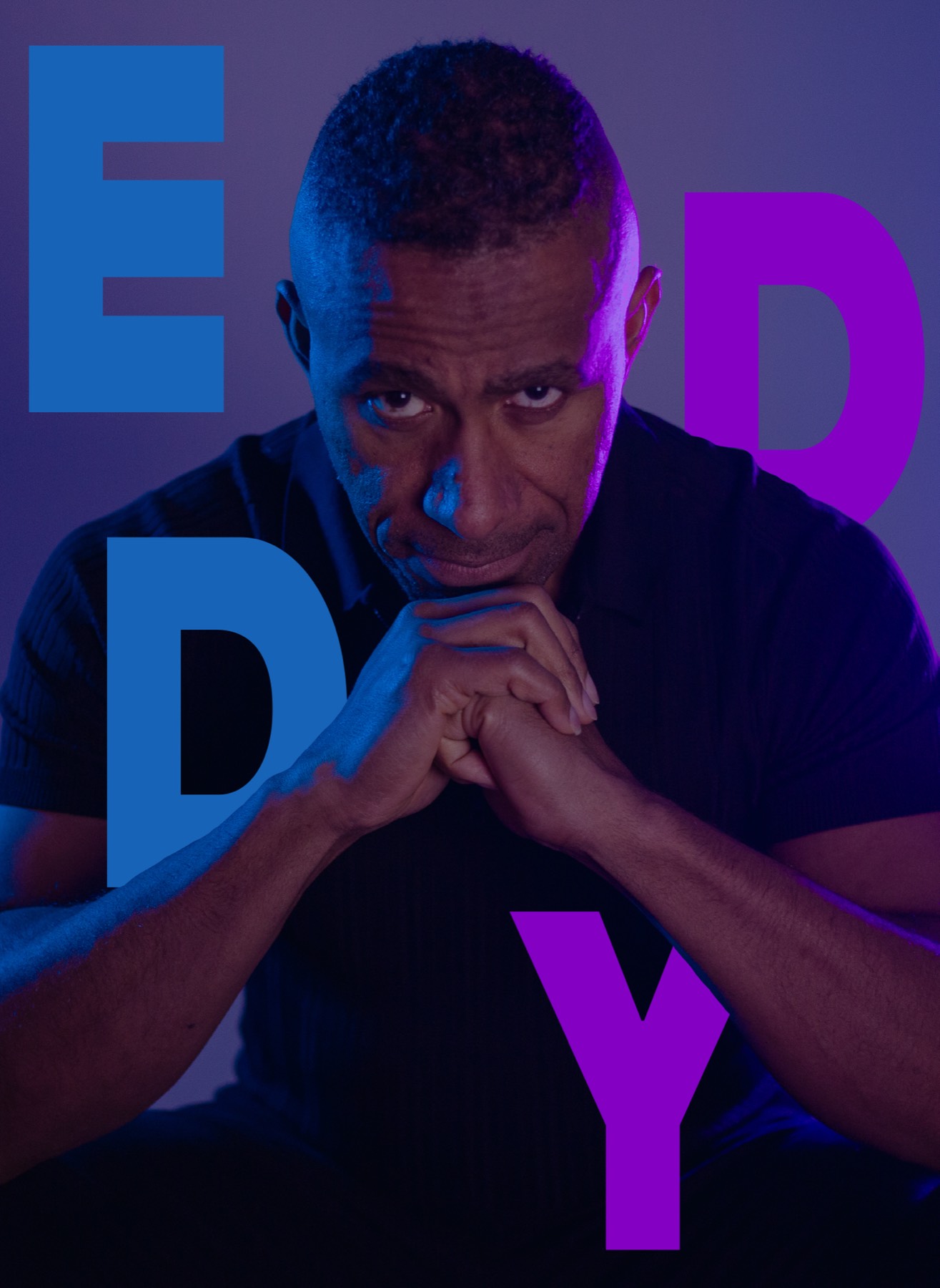 Film poster: Eddy with his hands folded under his chin, the title EDDY in large letters around his face